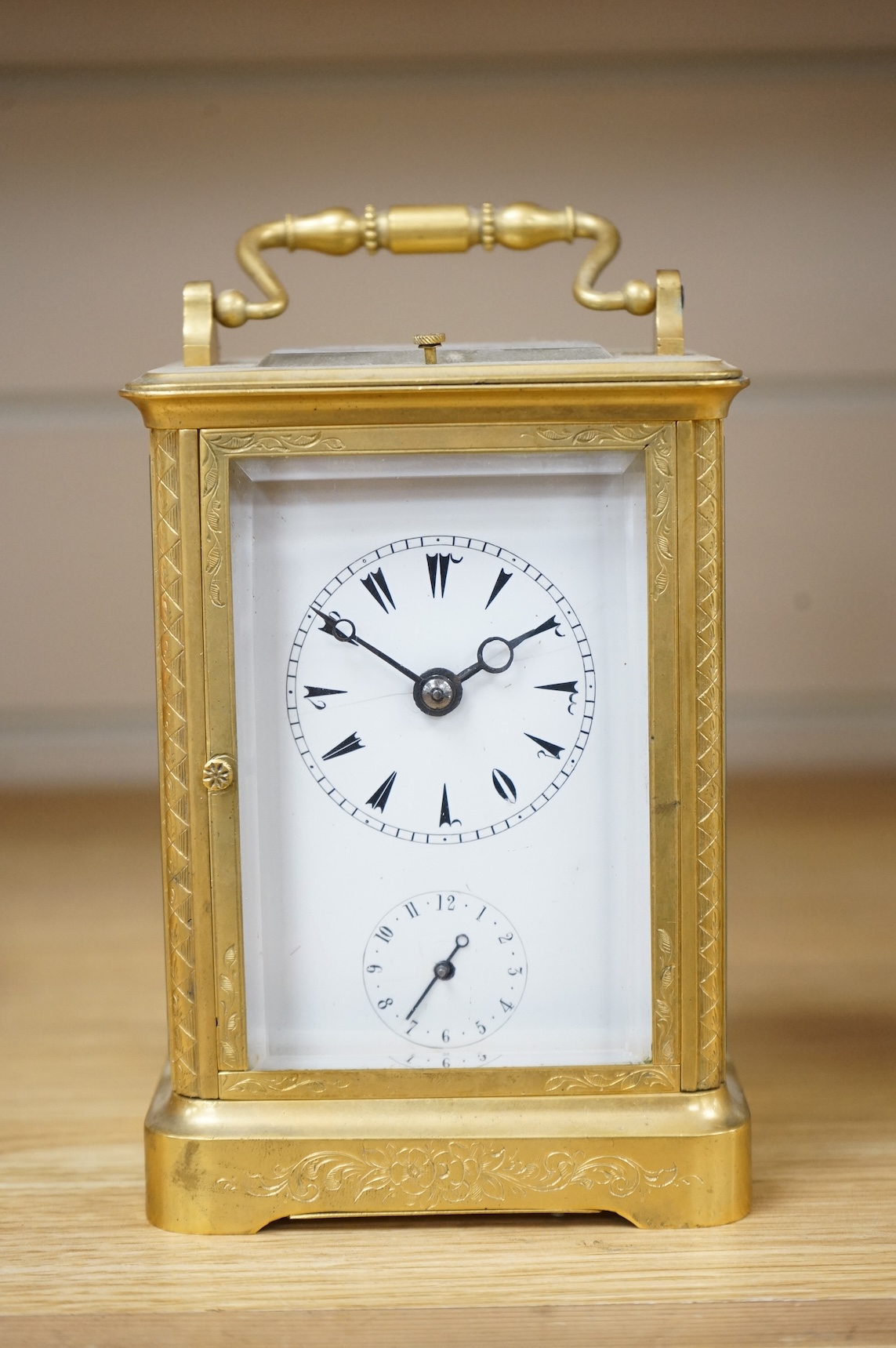 An Arabic market brass repeating carriage timepiece, 16cm